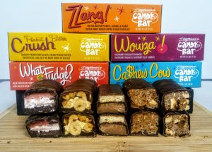 Zingerman's Candy Manufactory Zzang Candy Bar Flavors on a board with their colorful packaging