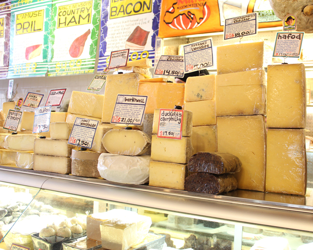 Zingerman's Deli Cheese Display counter, stacks of cheese, how to build cheeseboard