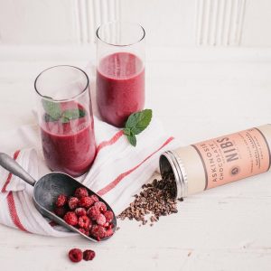 A picture of Askinosie Cocoa Nibs and raspeberry smoothies, a perfect summer choocolate treat
