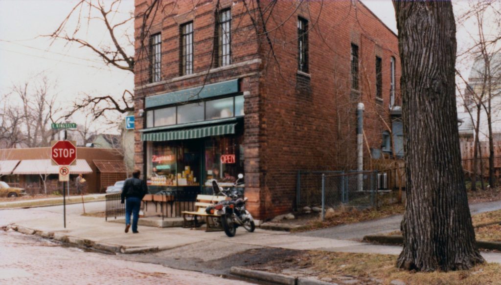 a historic photo of the brick Deli building