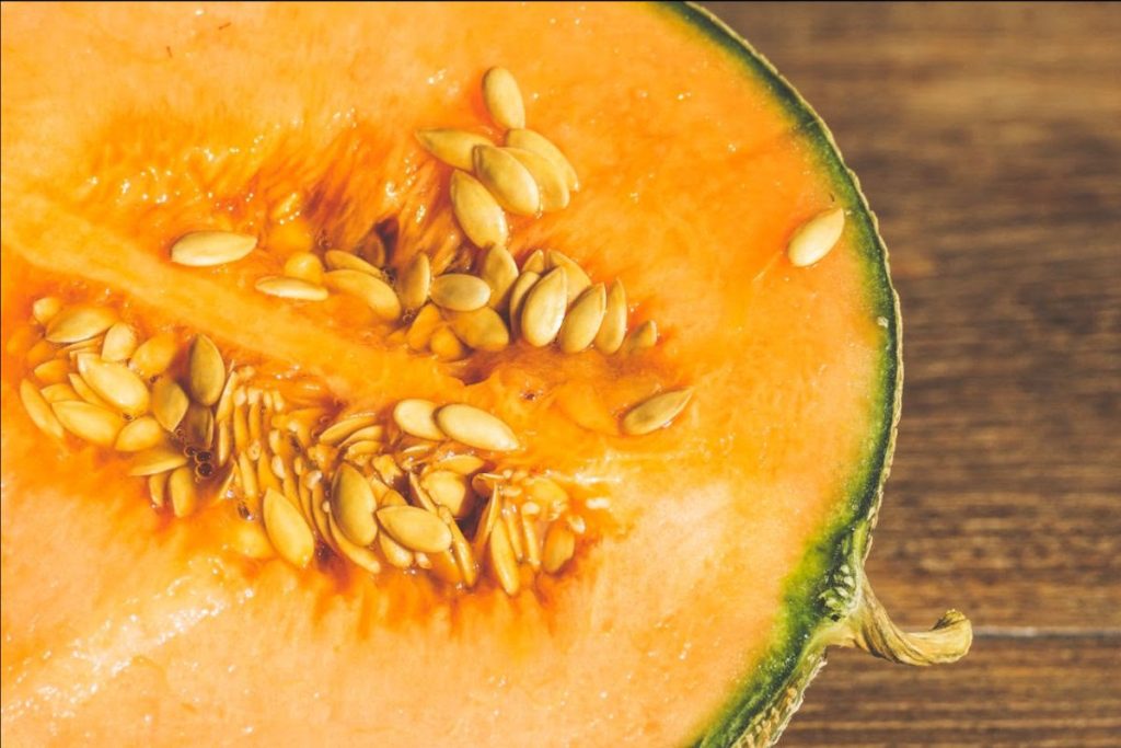A close-up photo of the inside of an orange melon.