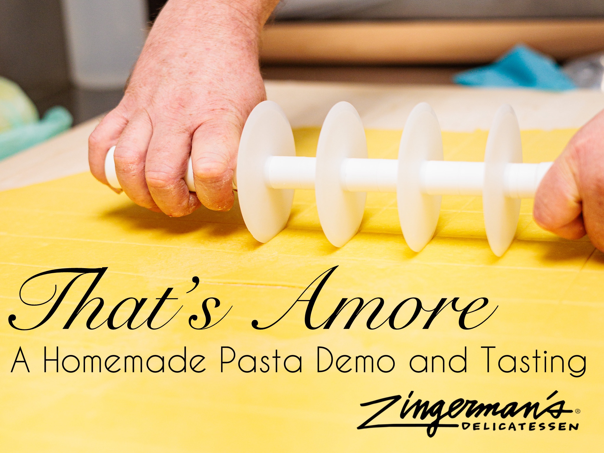 A photo of a set of hands rolling a ravioli cutter across a large sheet of fresh pasta, with text along the bottom that reads "That's Amore: A Homemade Pasta Demo and Tasting."