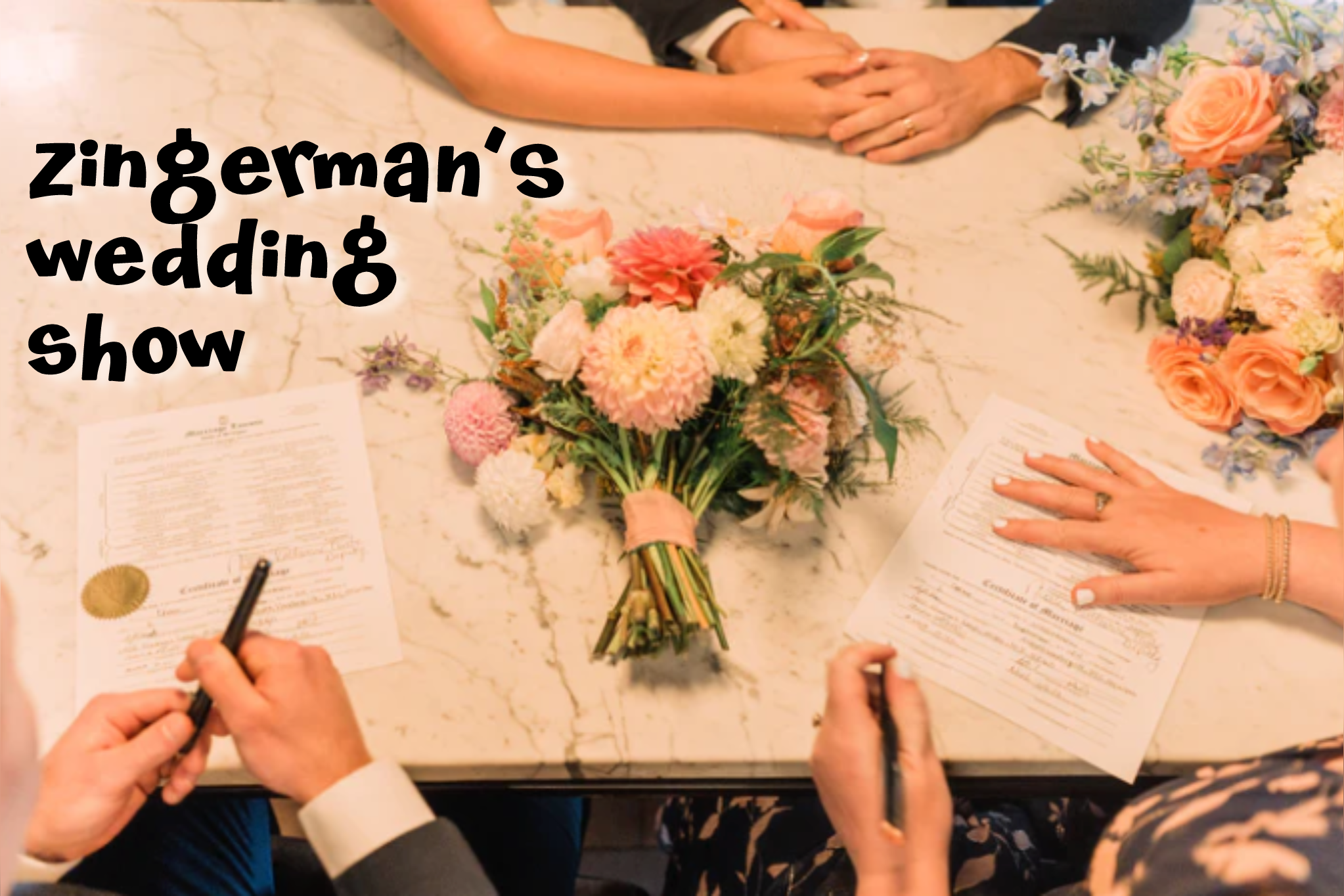 A photo of a marble counter with two bouquets lying on it, with the bride and groom holding hands on one side and two notaries on the other signing paperwork, with text to the side of the photo that reads "Zingerman's Wedding Show."