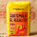 Guatemala El Regalito at the Coffee Company A photo of a bag of Guatemala El Regalito beans against a burlap coffee sack background.