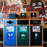 A photo of a set of waste stream sorting bins inside the Next Door Cafe.